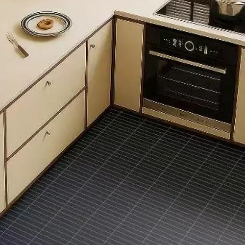 Kitchen flooring with stacked basalt black honed mosaic tiles